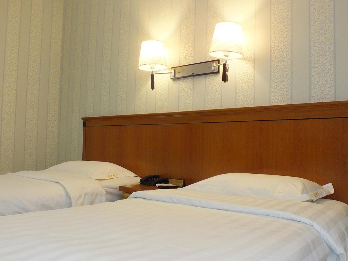 Beijing Fuxing Holiday Hotel Pequim Quarto foto